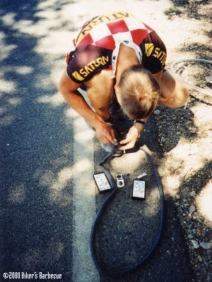 Tyre-Change Pit Stop in Incredible 5,3 Minutes - This picture refers to "Biker's Barbecue", page 195.